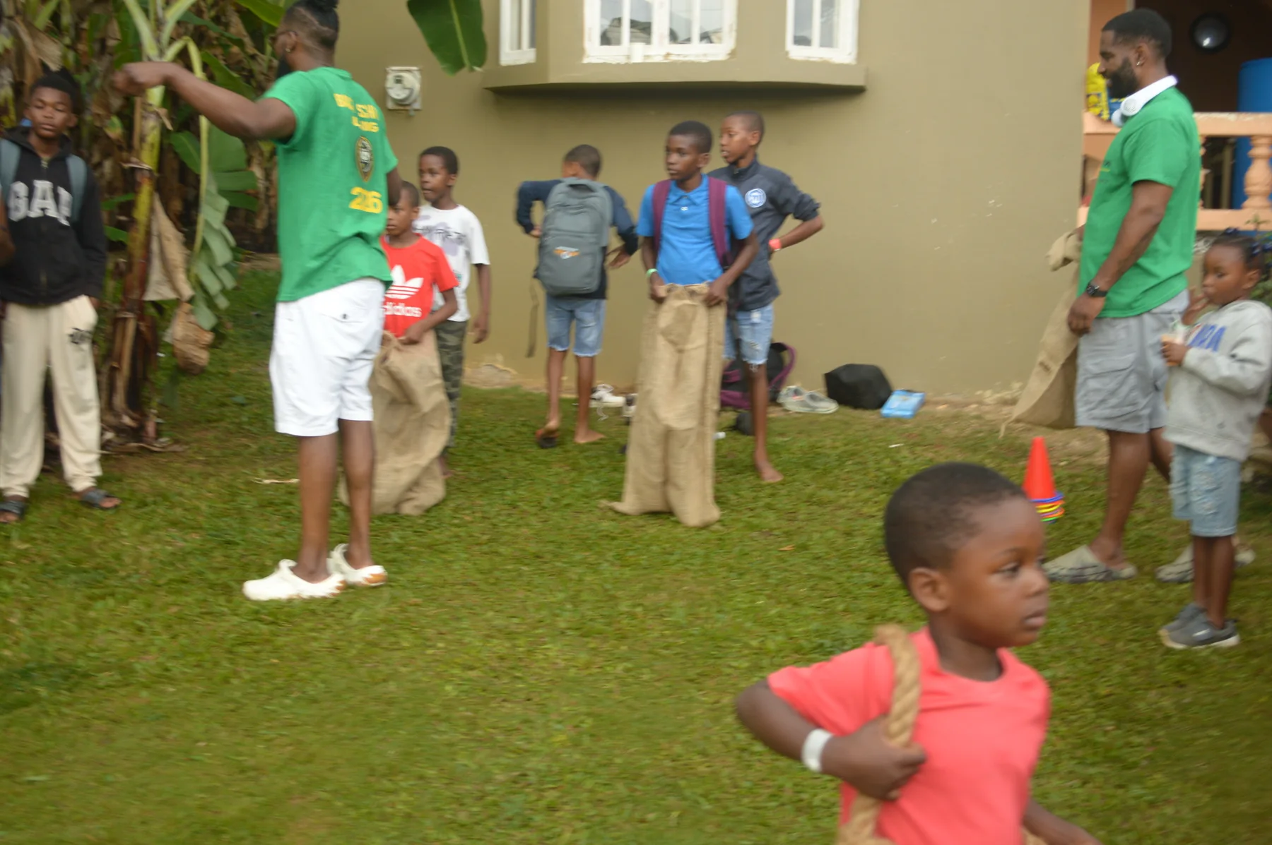 Children playing games with volunteers